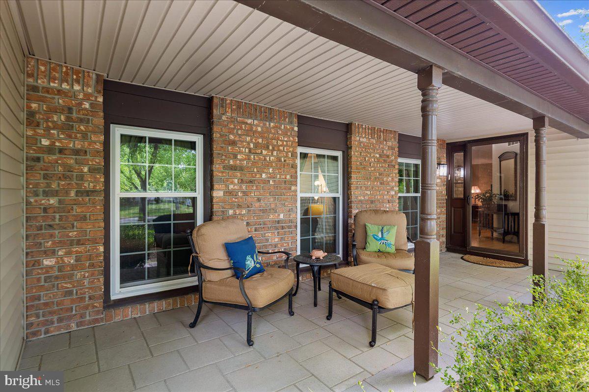 3 Strathmore Place Princeton Junction, NJ 08550 - Photo 3 of 29 a view of a patio with couple of chairs and a potted plant