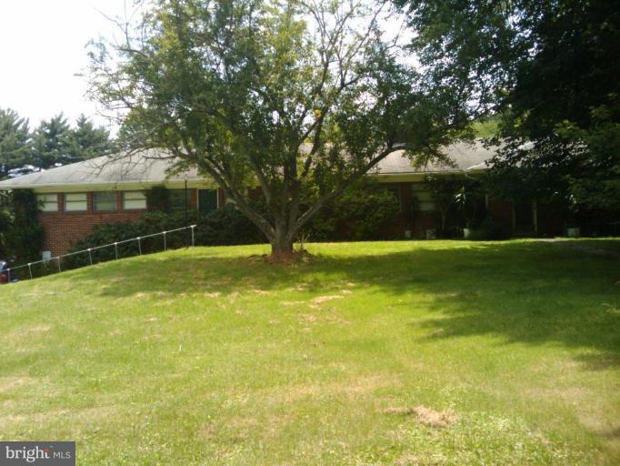 8811 Falls Road Potomac, MD 20854 - Photo 1 of 1 a view of swimming pool with green space