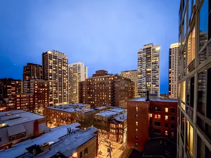 a view of a city with tall buildings