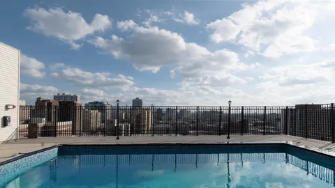 a view of a city with tall buildings