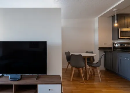 a view of a dining room with furniture