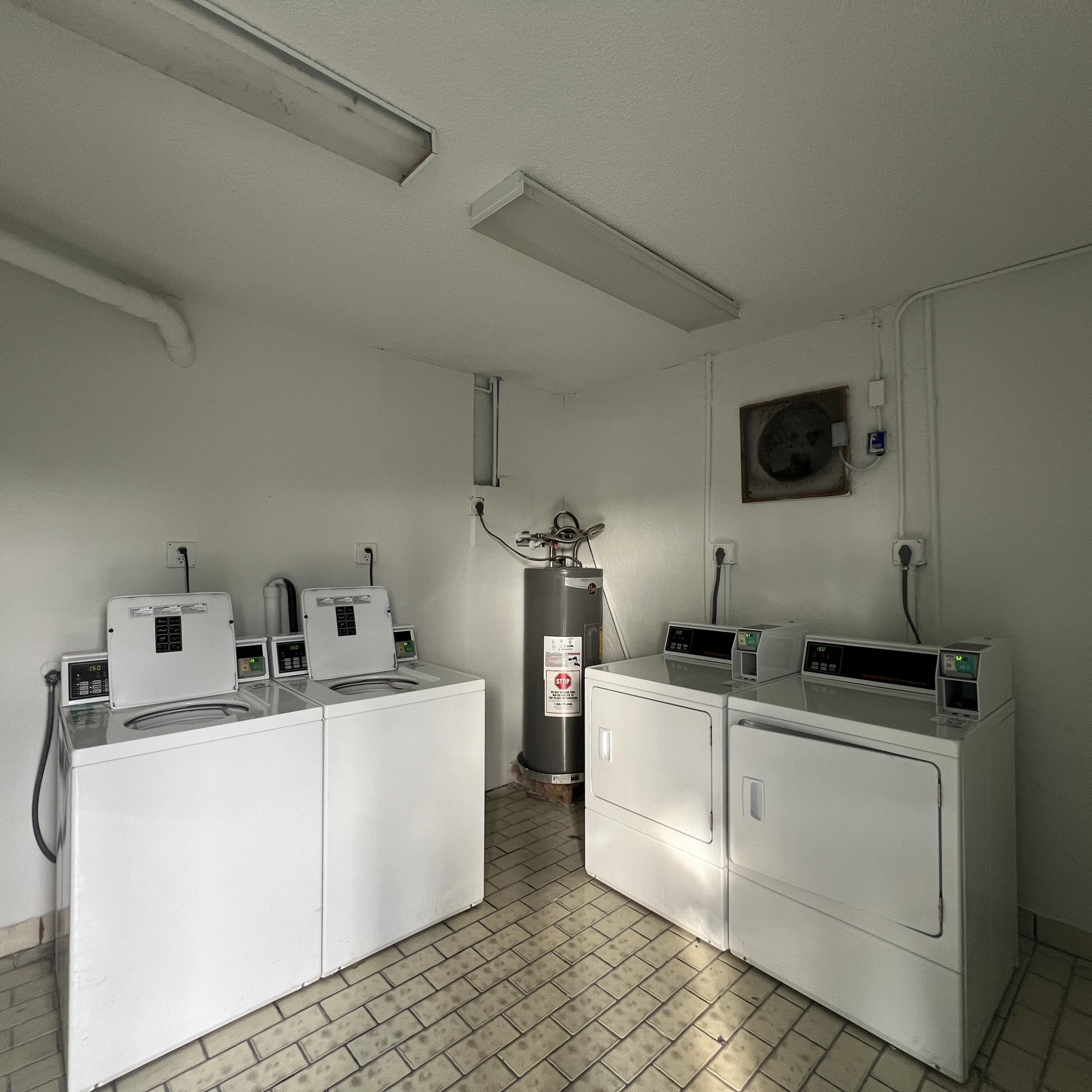 2141 Woolbright Road, Unit L204 Boynton Beach, FL 33426 - Photo 18 of 18 a room with storage and utility