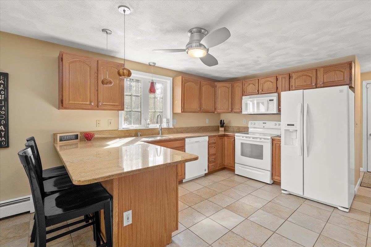 487 Wallace Road Bedford, NH 03110 - Photo 7 of 39 Gallery Image 7