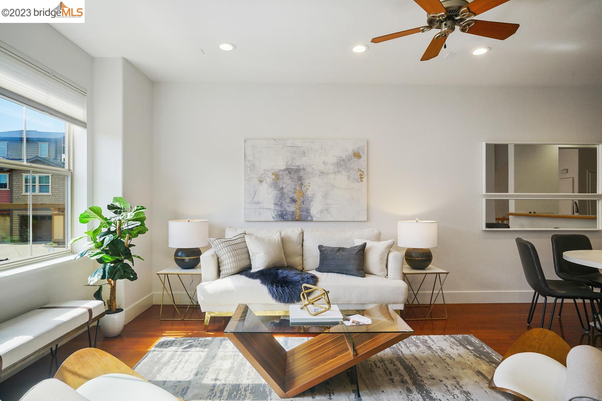 6047 Old Quarry Loop Oakland, CA 94605 - Photo 1 of 1 a living room with furniture and wooden floor
