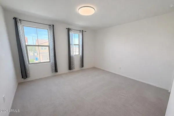 an empty room with windows