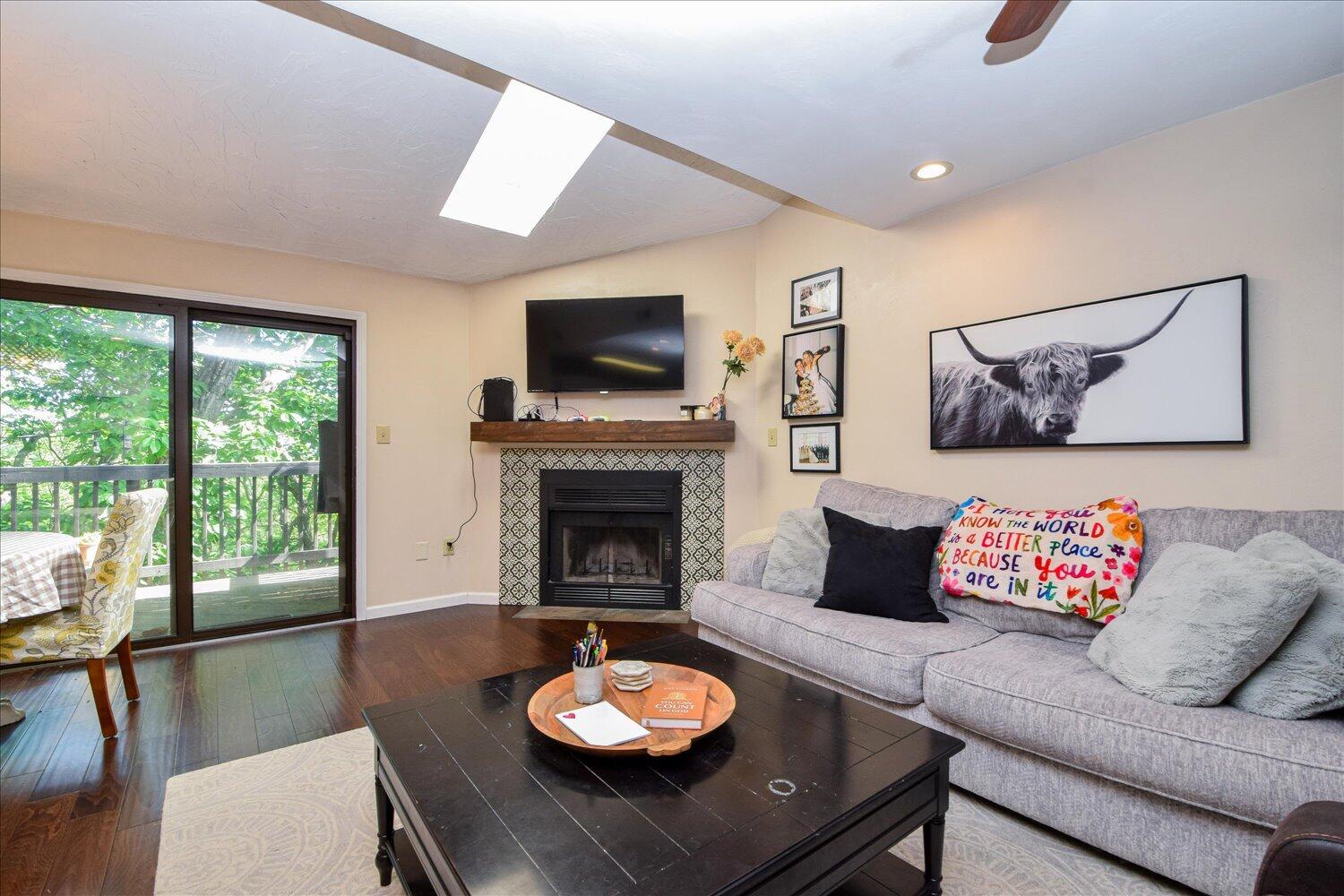 3279 Forest Ridge Road Roanoke, VA 24018 - Photo 3 of 21 a living room with furniture and a fireplace