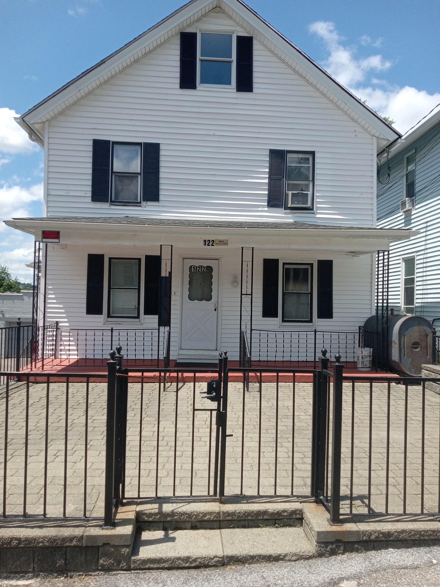 a view of a house with a porch