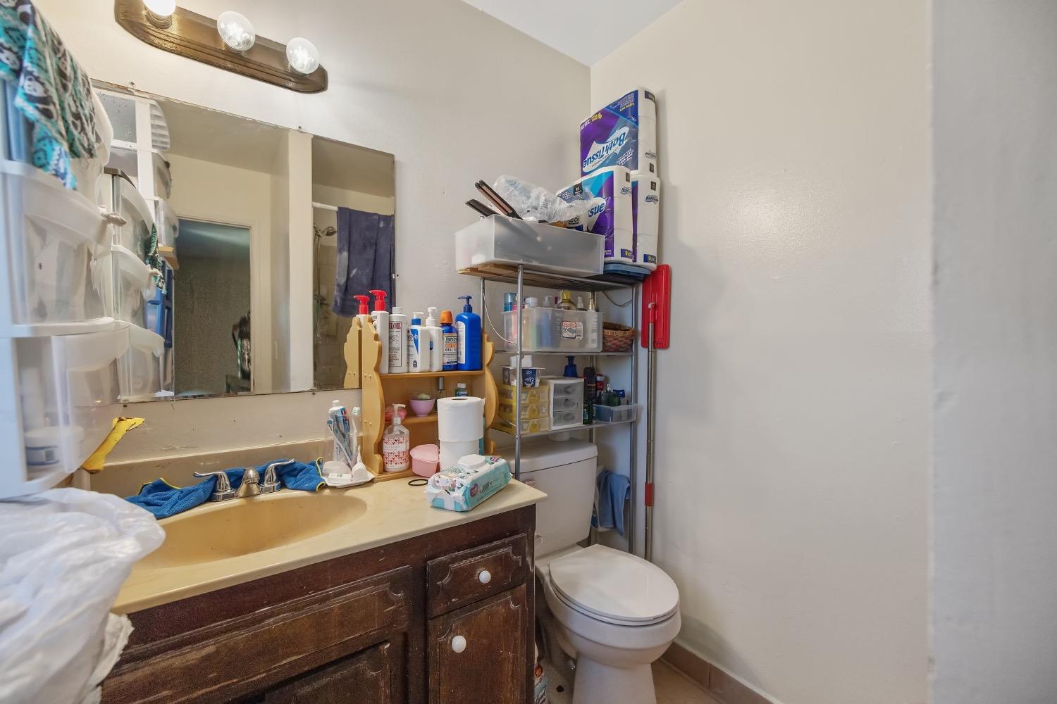 709 Ashlan Way Madera, CA 93638 - Photo 17 of 23 a room with storage and utility