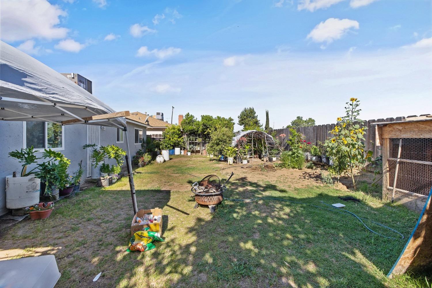 709 Ashlan Way Madera, CA 93638 - Photo 23 of 23 a view of a garden