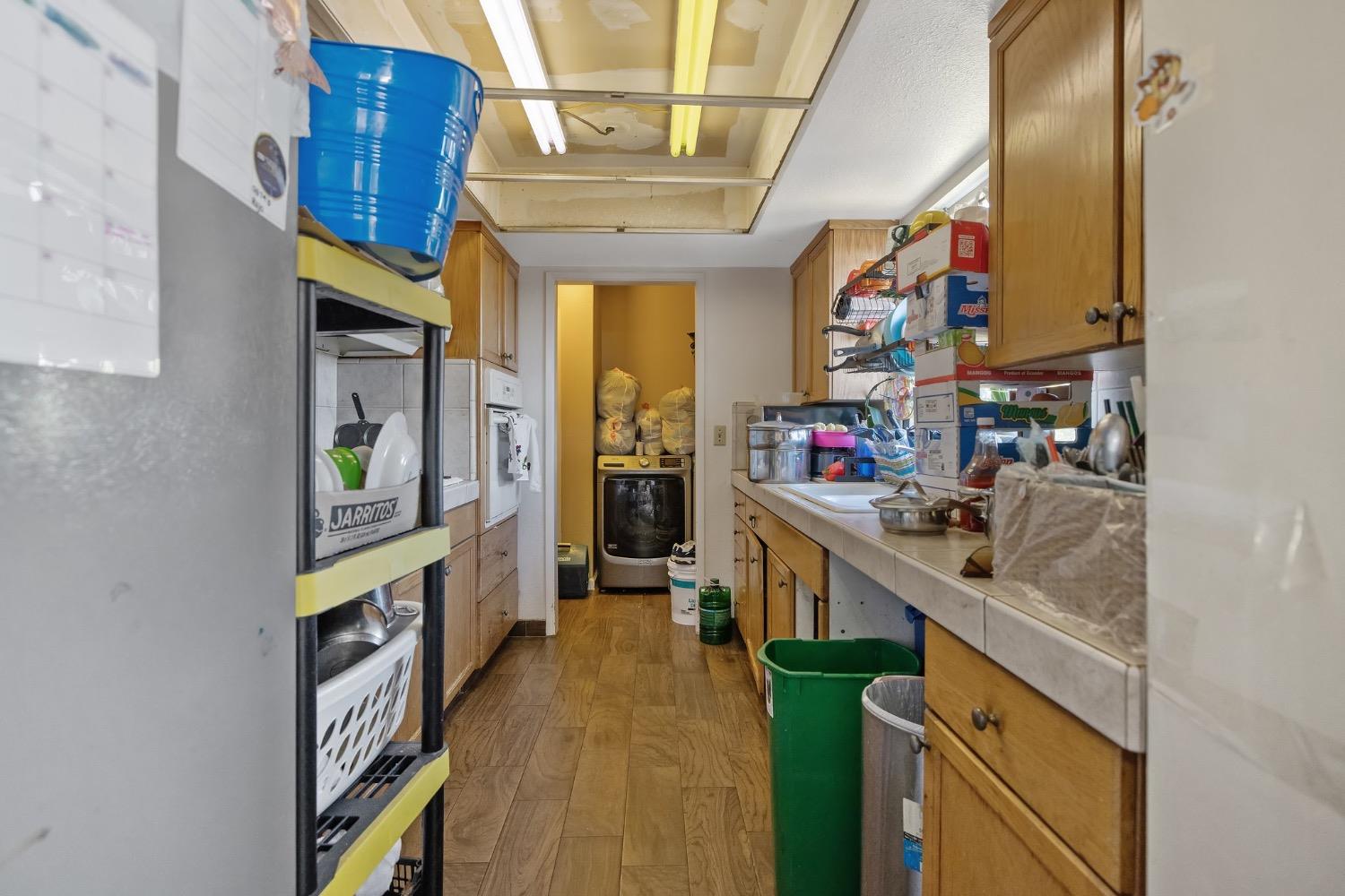 709 Ashlan Way Madera, CA 93638 - Photo 9 of 23 a kitchen with lots of counter top space