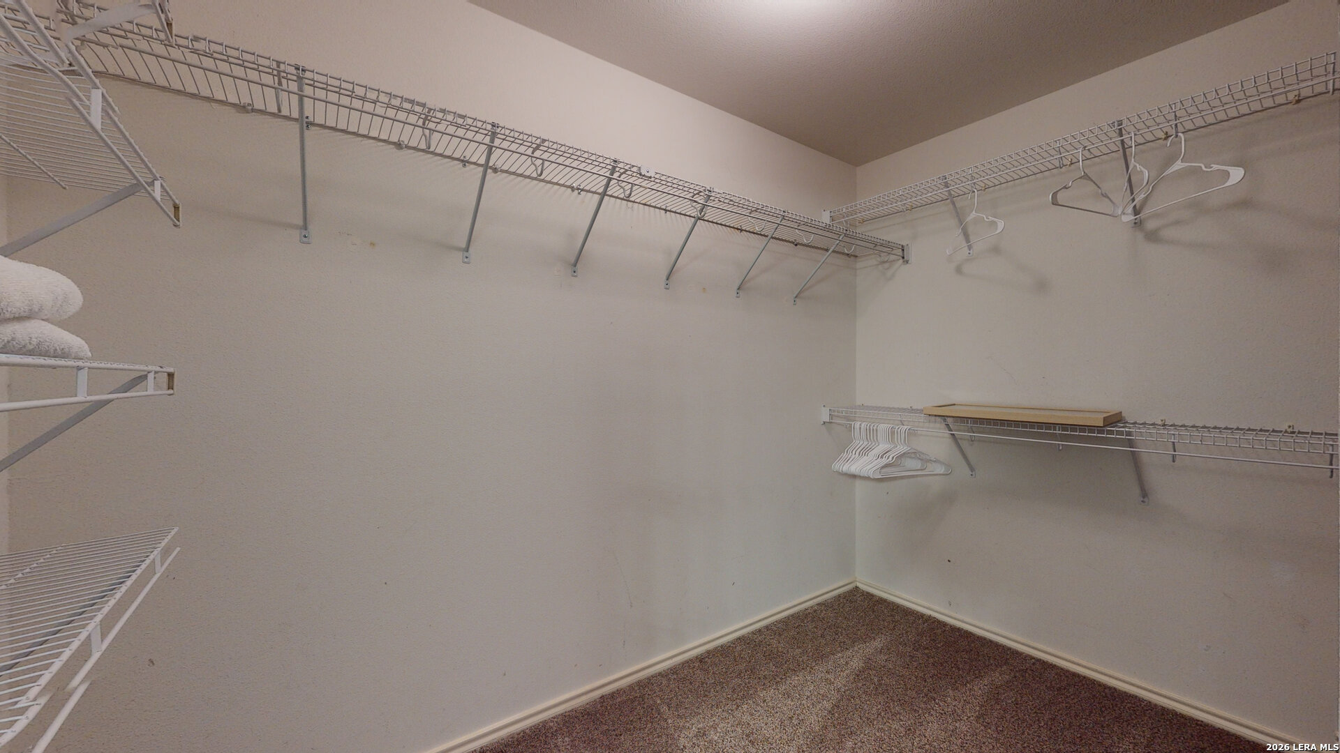 5614 Spring Quail San Antonio, TX 78247 - Photo 39 of 43 a view of a room with racks on the wall