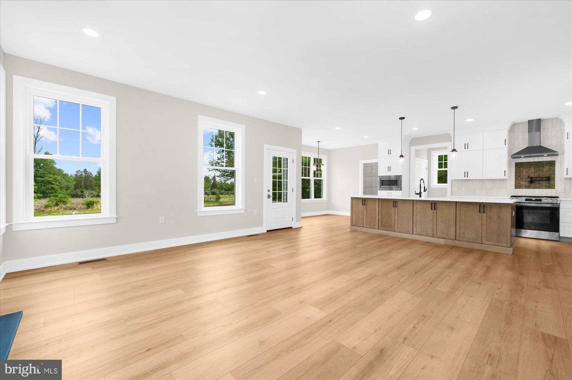 394 Renninger Road Perkiomenville, PA 18074 - Photo 17 of 41 a view of kitchen with wooden floor and window