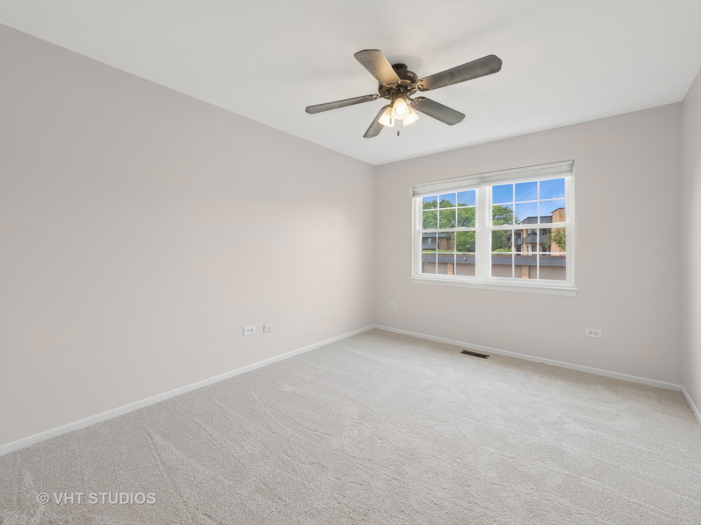 1102 North Knollwood Drive Palatine, IL 60067 - Photo 14 of 15 a view of an empty room with a window