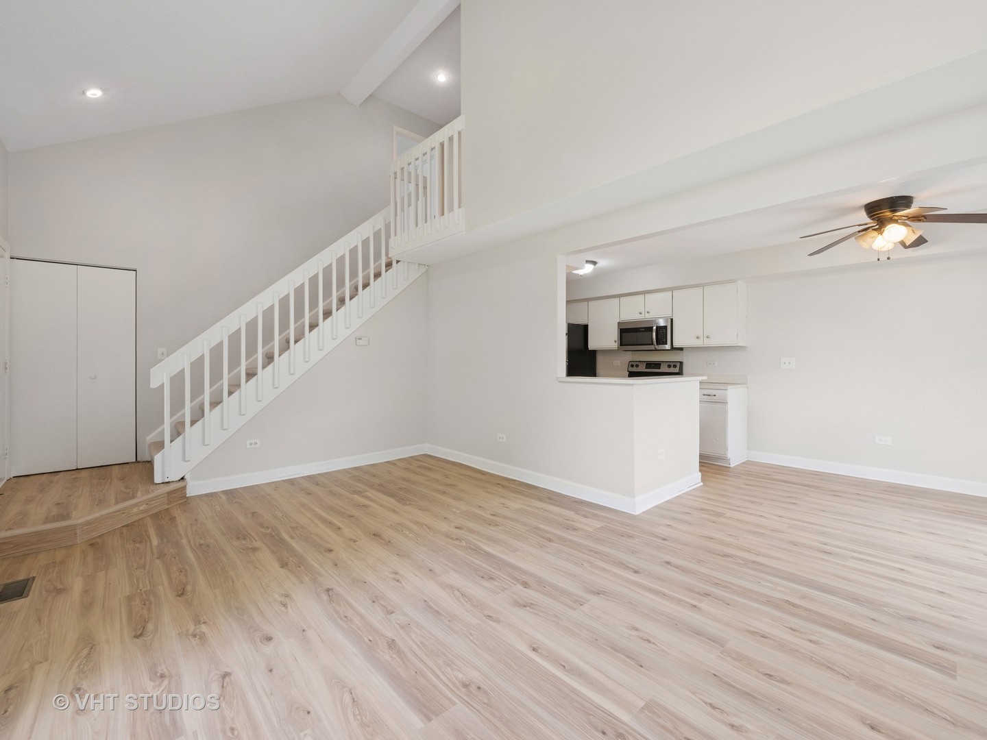 1102 North Knollwood Drive Palatine, IL 60067 - Photo 4 of 15 a view of a livingroom with wooden floor