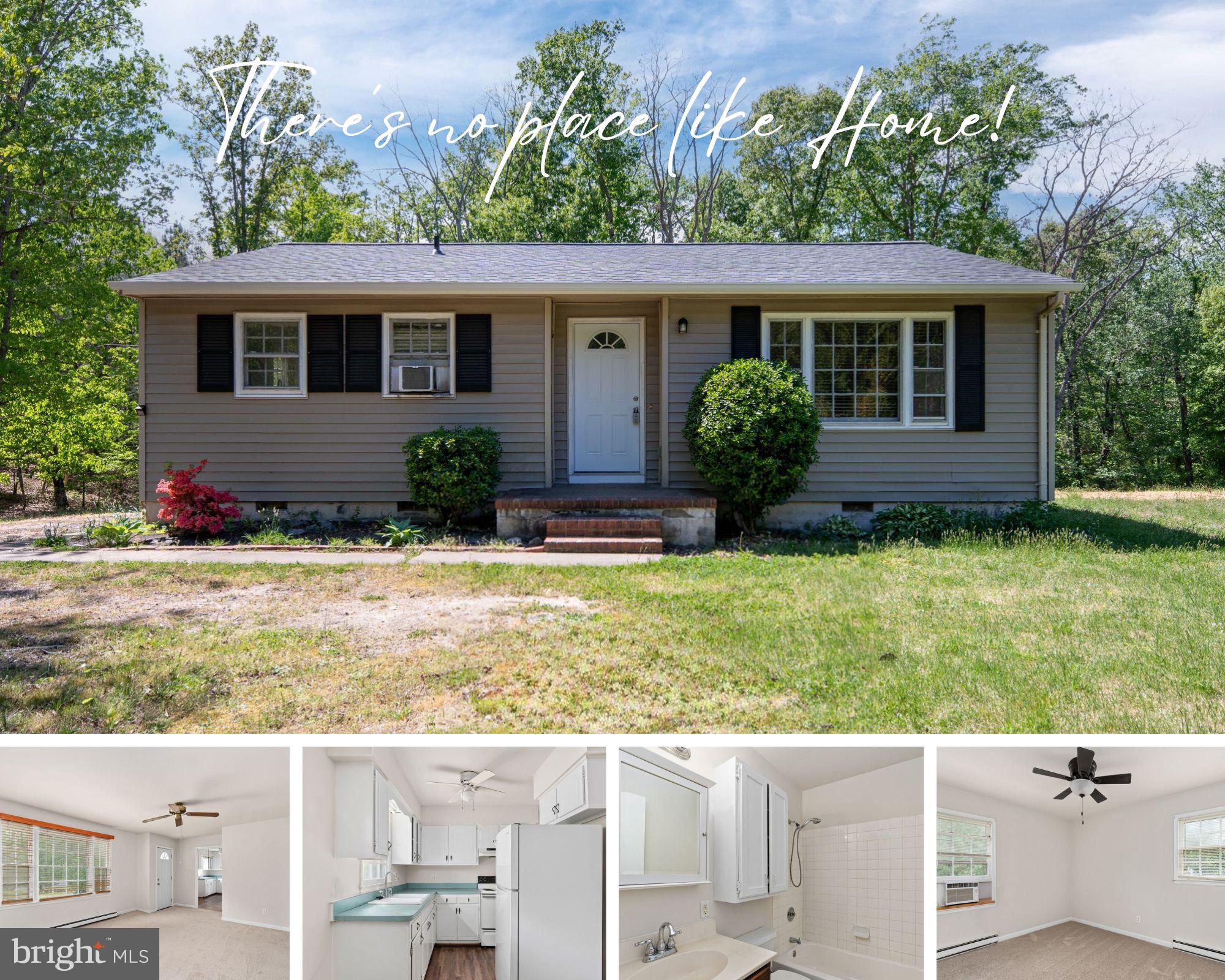 14208 Springfield Lane King George, VA 22485 - Photo 1 of 41 a view of house with backyard outdoor seating and green space