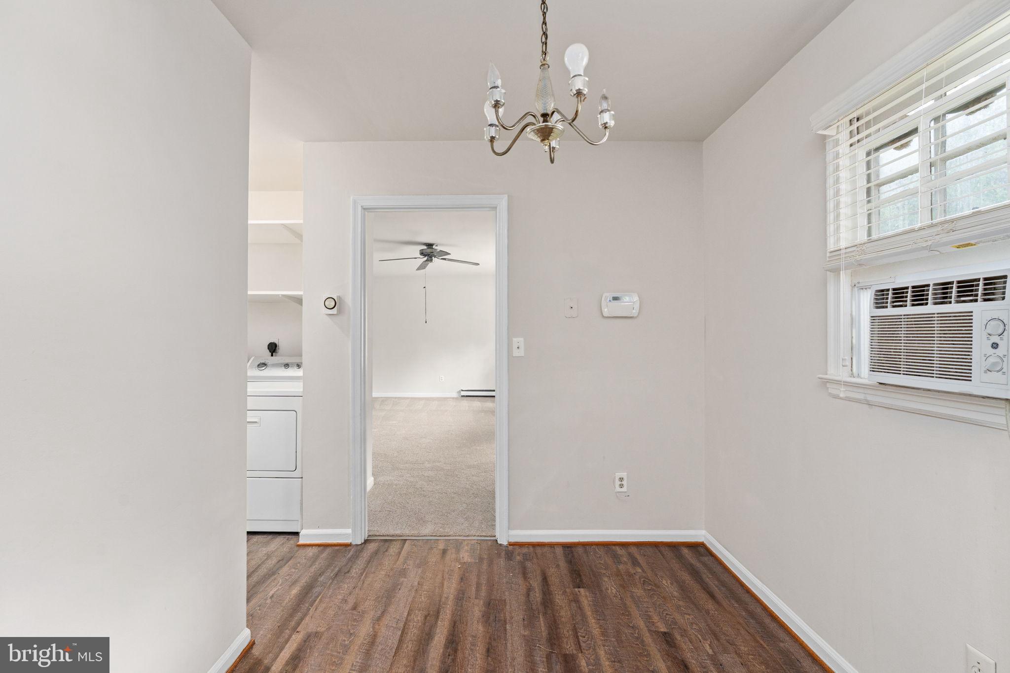 14208 Springfield Lane King George, VA 22485 - Photo 12 of 41 a view of a room with wooden floor and window
