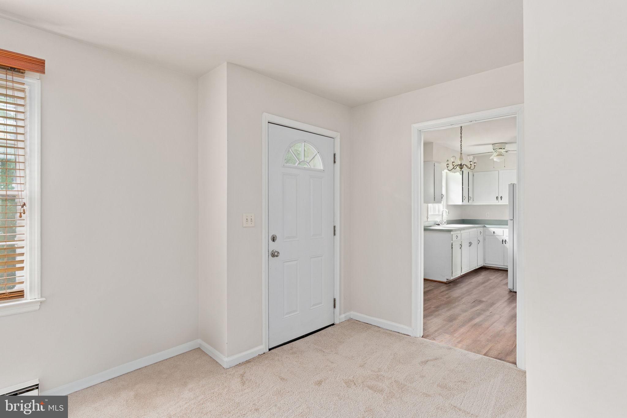 14208 Springfield Lane King George, VA 22485 - Photo 2 of 41 a view of empty room with wooden floor