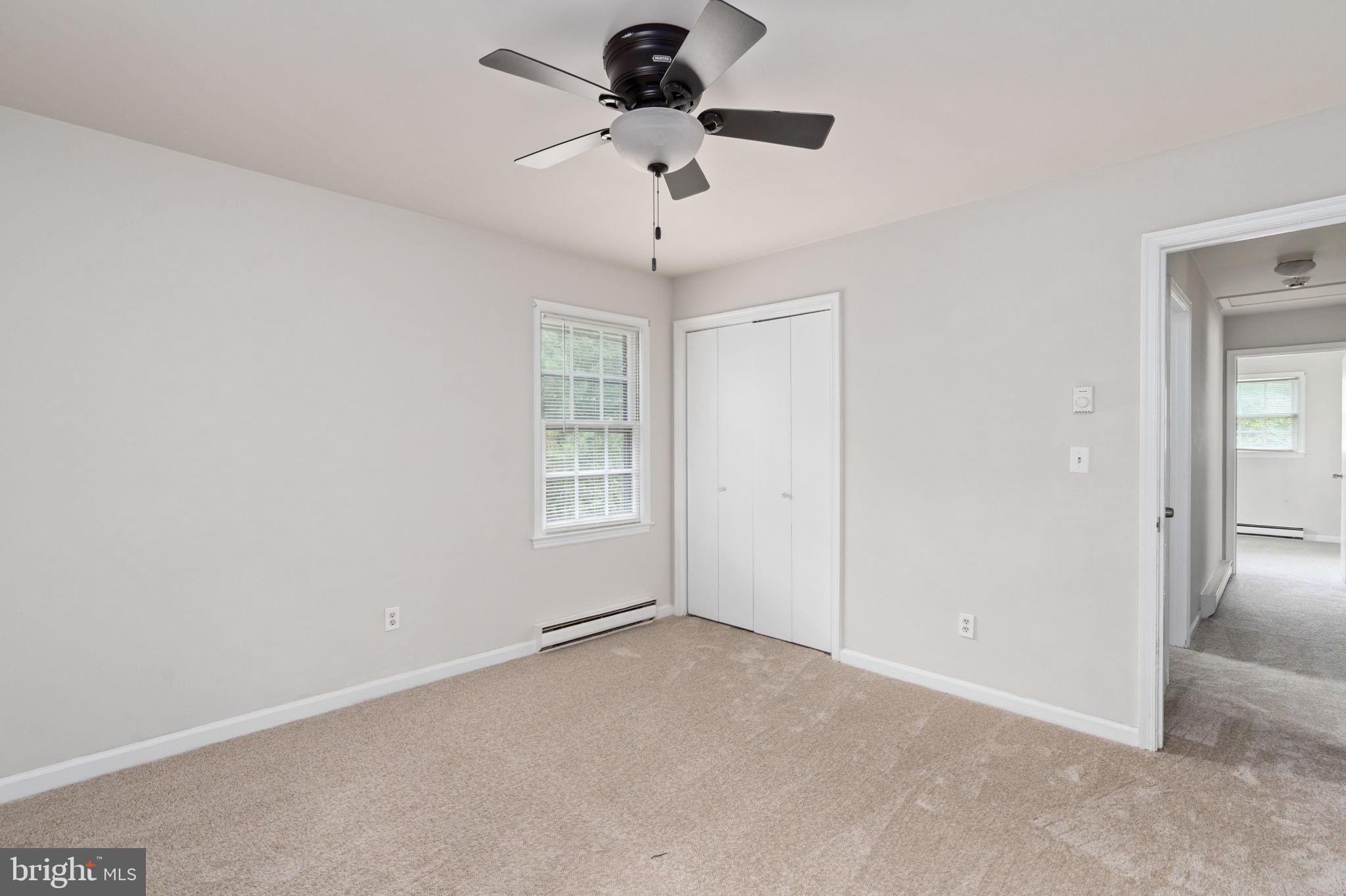 14208 Springfield Lane King George, VA 22485 - Photo 26 of 41 an empty room with a ceiling fan and window