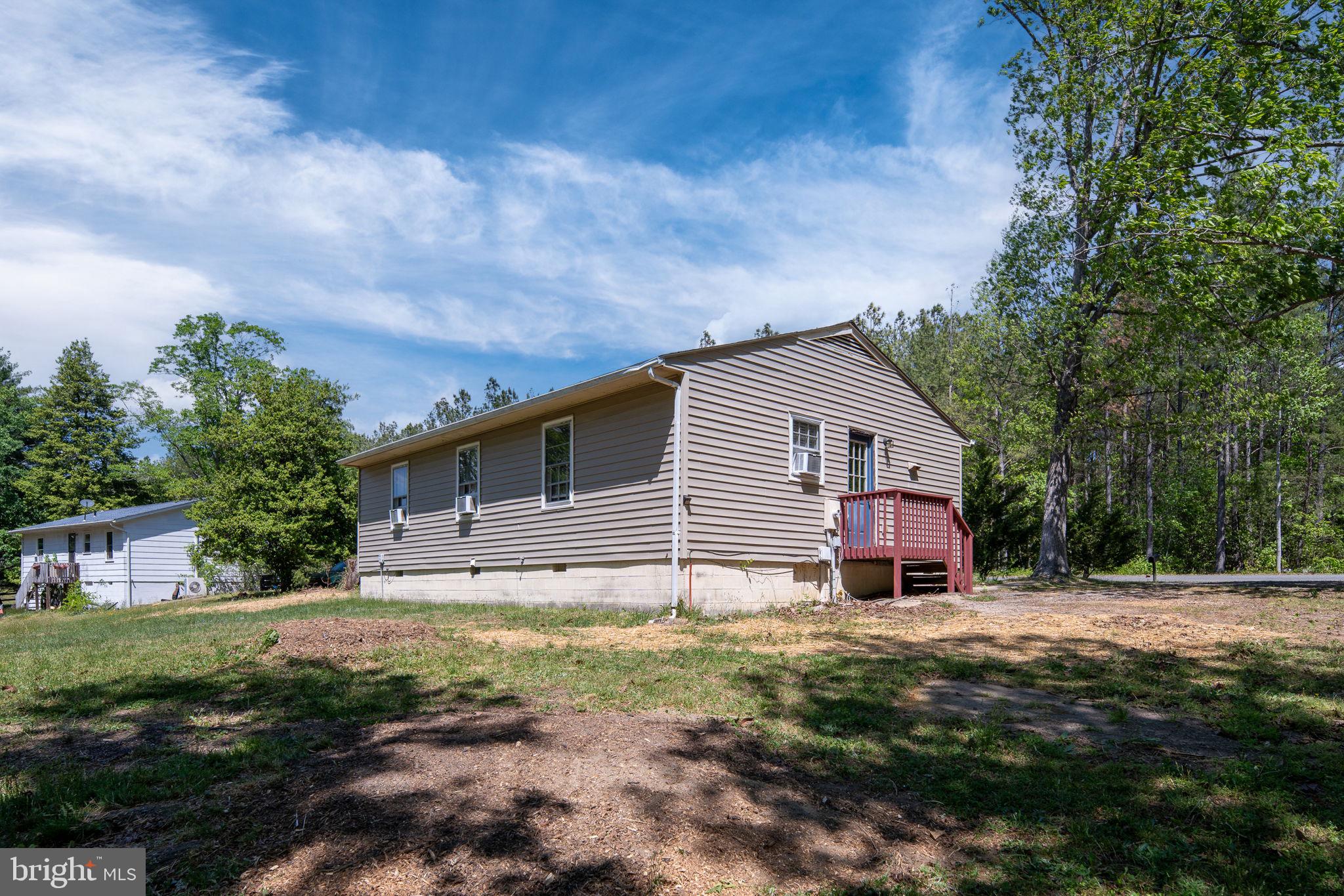 14208 Springfield Lane King George, VA 22485 - Photo 33 of 41 a backyard of house with garden and trees