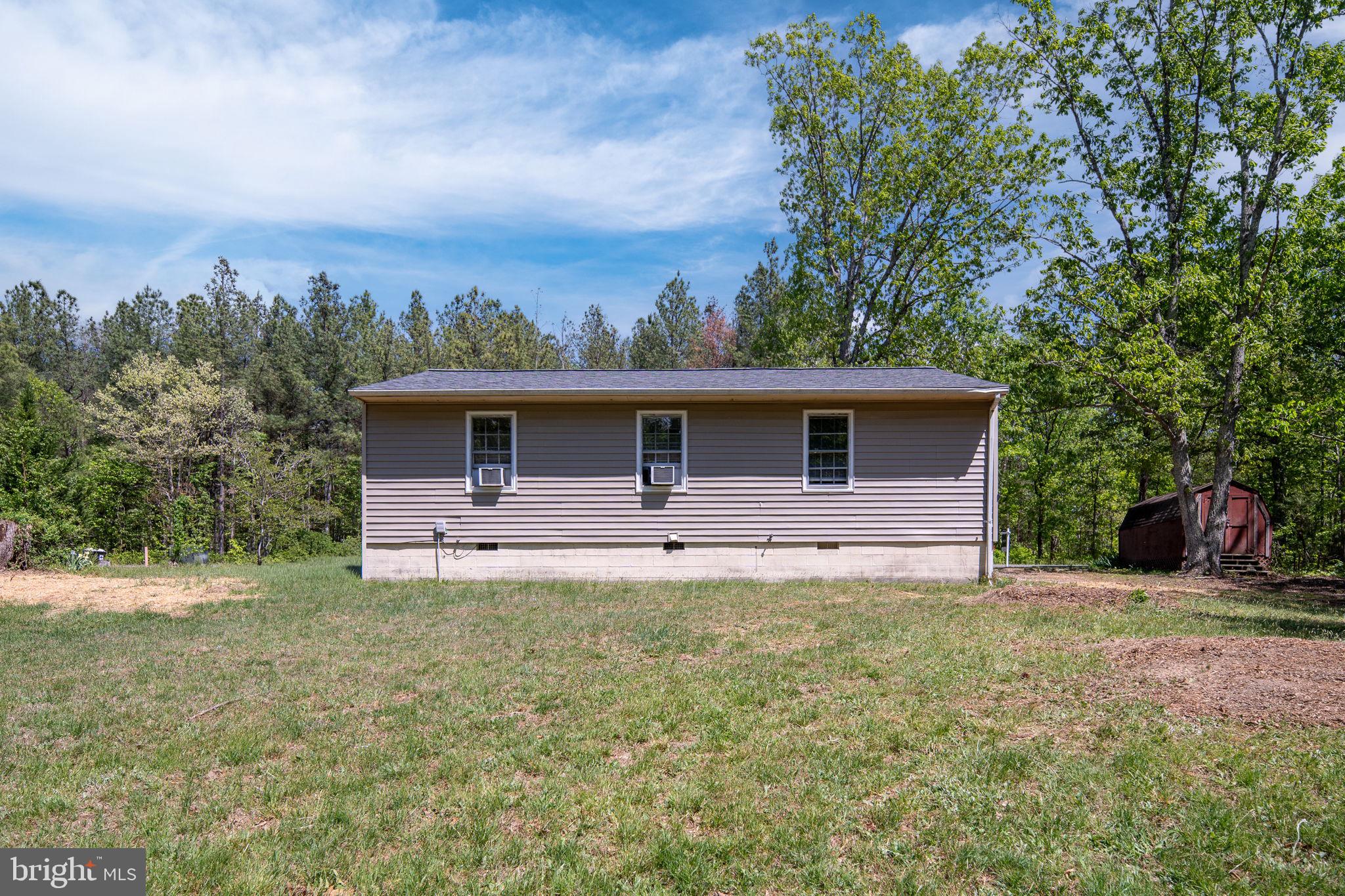 14208 Springfield Lane King George, VA 22485 - Photo 34 of 41 a front view of a house with a yard