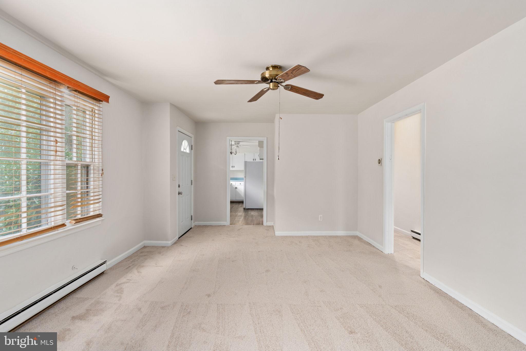 14208 Springfield Lane King George, VA 22485 - Photo 6 of 41 a view of empty room with windows
