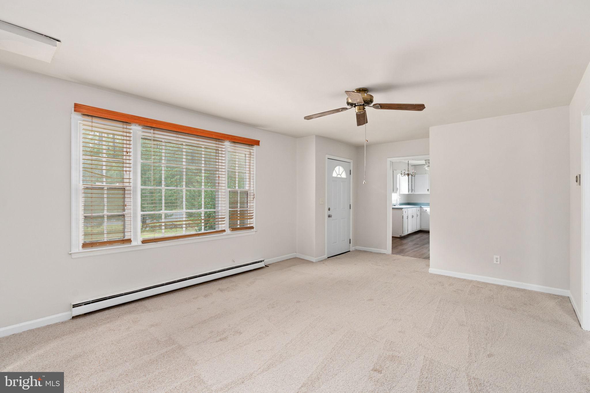 14208 Springfield Lane King George, VA 22485 - Photo 7 of 41 wooden floor in an empty room with a window