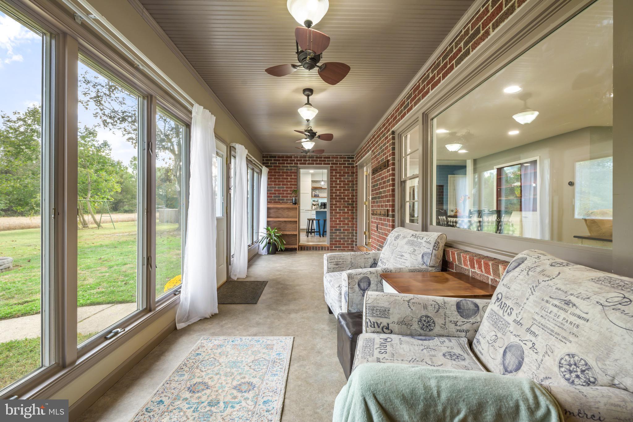 376 Griscom Drive Mannington, NJ 08079 - Photo 14 of 48 a living room with furniture and a large window