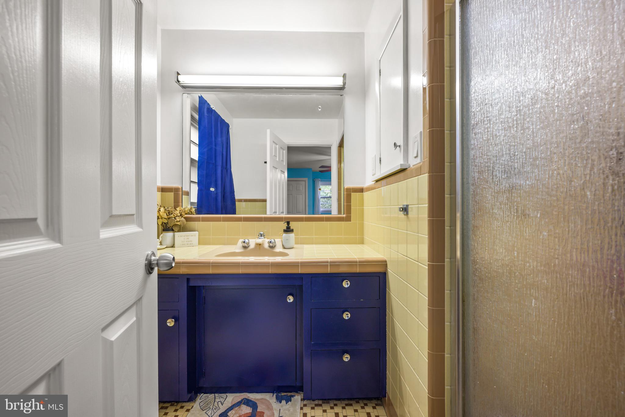 376 Griscom Drive Mannington, NJ 08079 - Photo 19 of 48 a bathroom with a granite countertop sink and a mirror