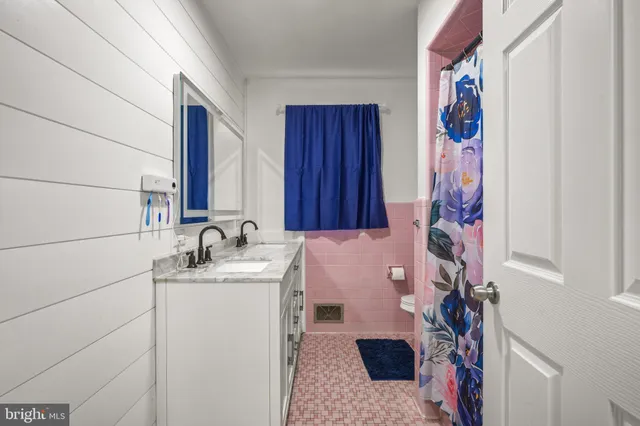 a view of a hallway with staircase