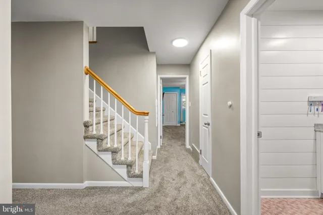 a bed room with a bed and a dresser