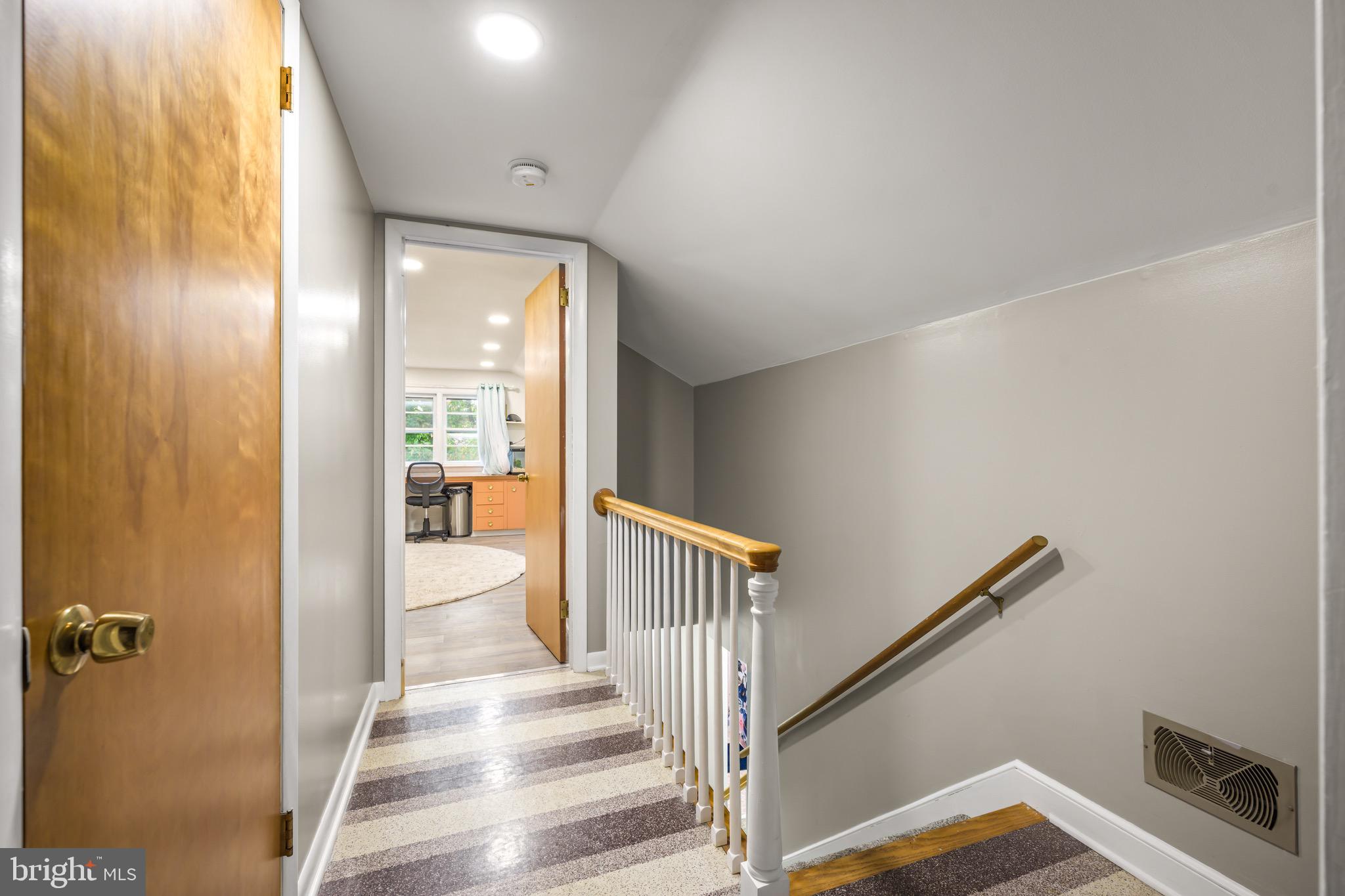 376 Griscom Drive Mannington, NJ 08079 - Photo 27 of 48 a view of a hallway with wooden floor and windows