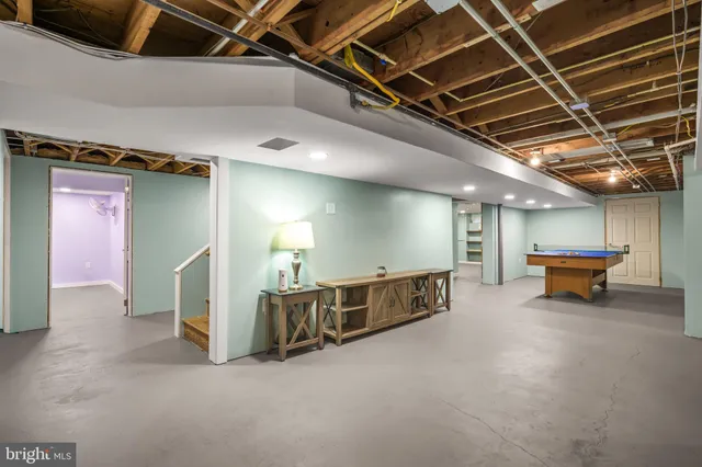 a view of a livingroom with gym equipment