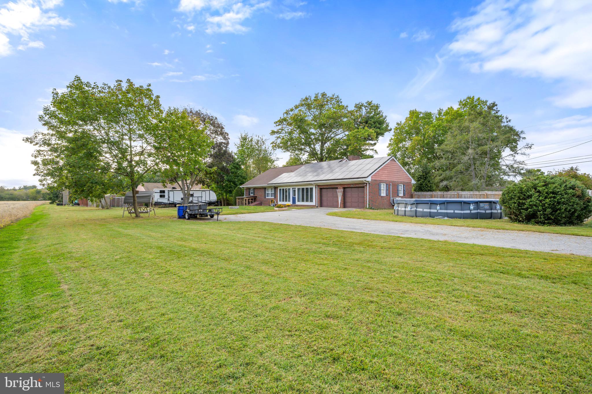 376 Griscom Drive Mannington, NJ 08079 - Photo 46 of 48 a front view of a house with garden