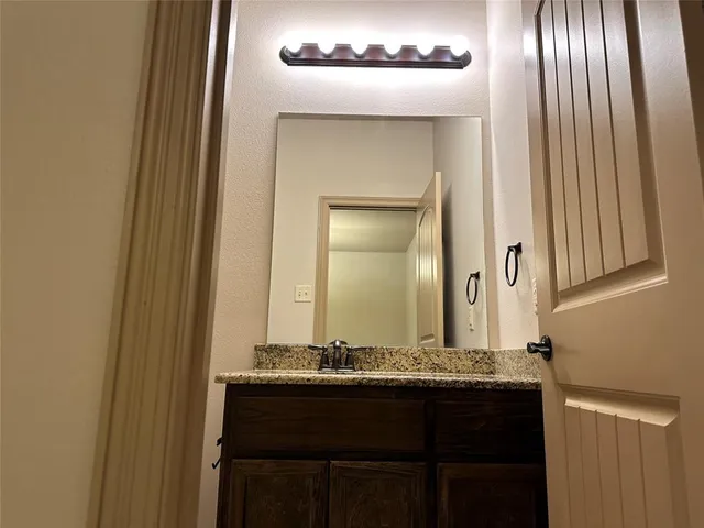 a bathroom with a sink a toilet and a bathtub