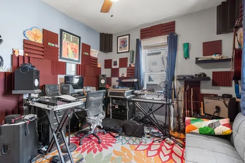a view of a workspace with furniture