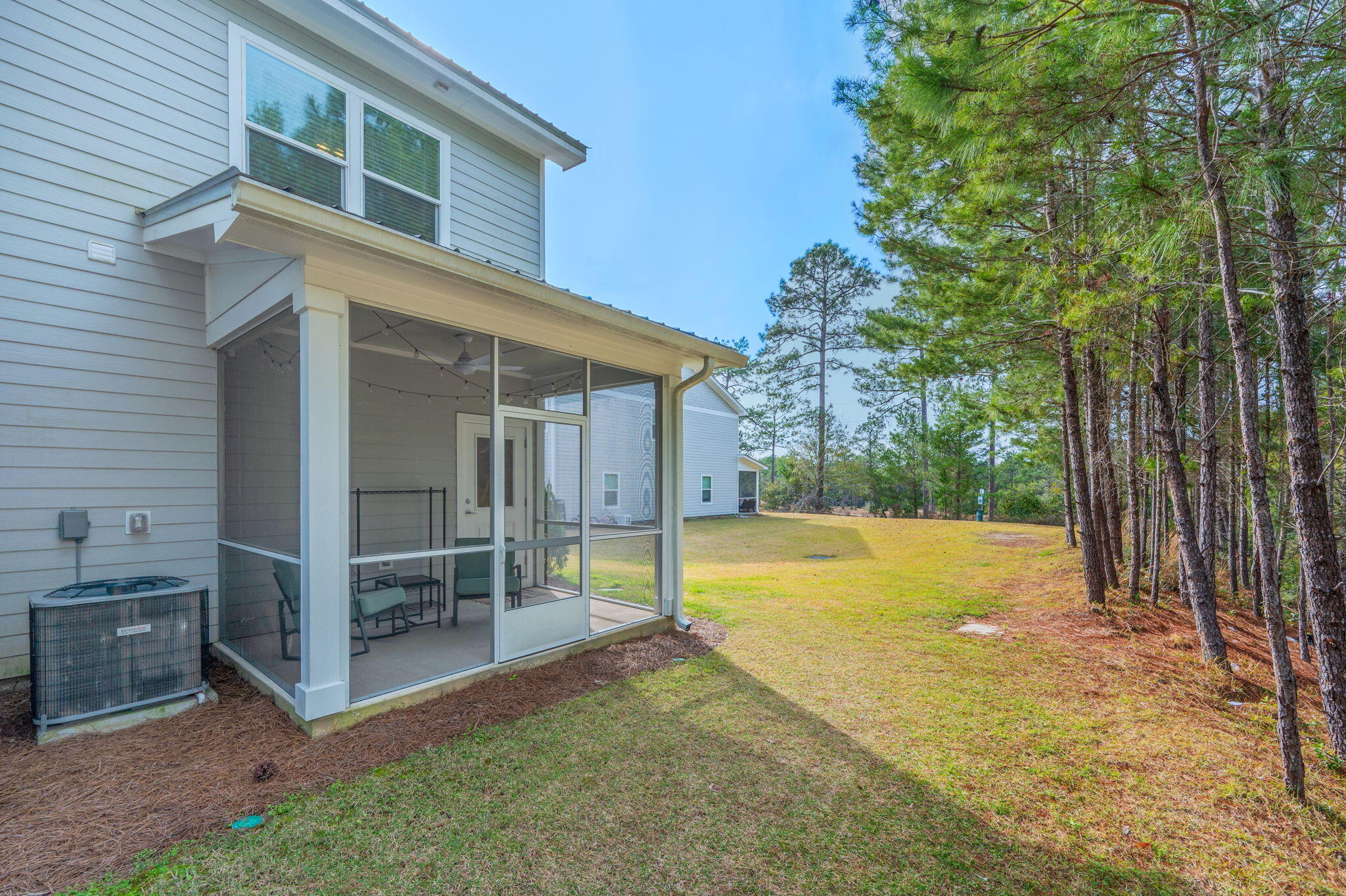 320 North Sand Palm Road Freeport, FL 32439 - Photo 26 of 30 Screened in Patio and Backyard
