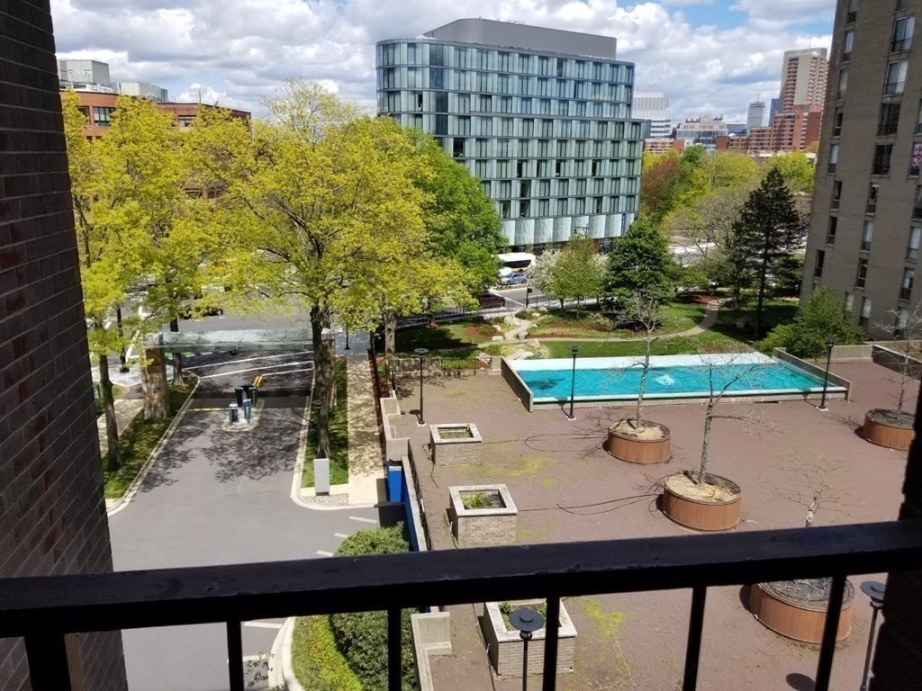 44 Washington Street, Unit 601 Brookline, MA 02445 - Photo 9 of 24 a view of a balcony with chairs