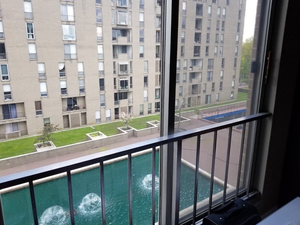 44 Washington Street, Unit 601 Brookline, MA 02445 - Photo 10 of 24 a view of balcony with a yard