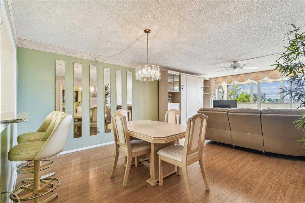 17920 Gulf Boulevard, Unit 208 Redington Shores, FL 33708 - Photo 18 of 98 a dining room with furniture and window
