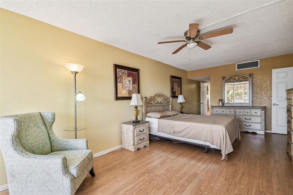 17920 Gulf Boulevard, Unit 208 Redington Shores, FL 33708 - Photo 26 of 98 a bedroom with a bed and window