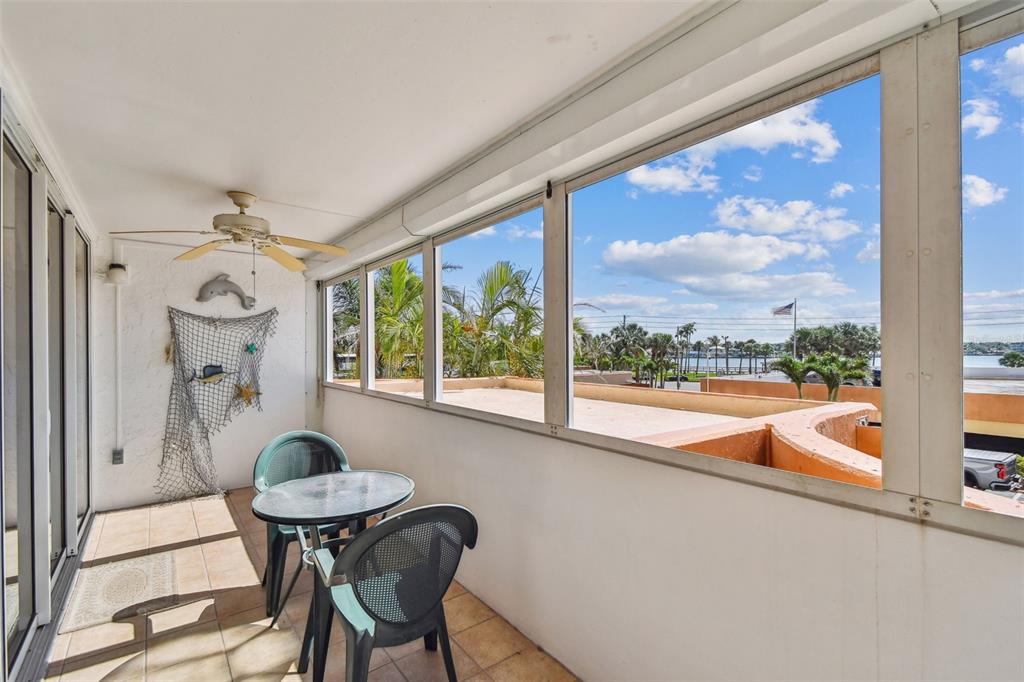 17920 Gulf Boulevard, Unit 208 Redington Shores, FL 33708 - Photo 44 of 98 a view of a dining room with furniture window and outside view