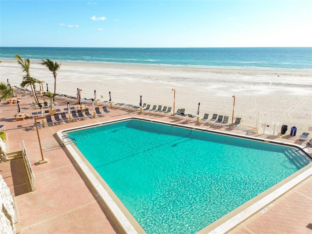 17920 Gulf Boulevard, Unit 208 Redington Shores, FL 33708 - Photo 69 of 98 a view of a swimming pool with outdoor seating