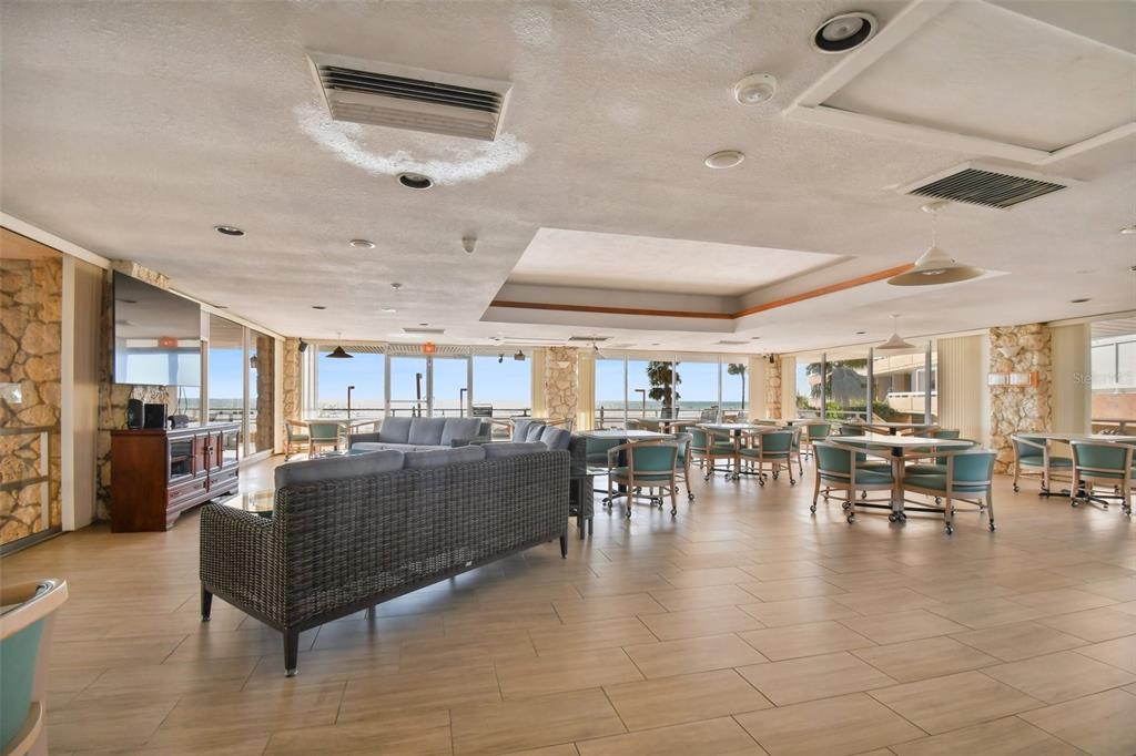 17920 Gulf Boulevard, Unit 208 Redington Shores, FL 33708 - Photo 87 of 98 a living room with furniture and a large window