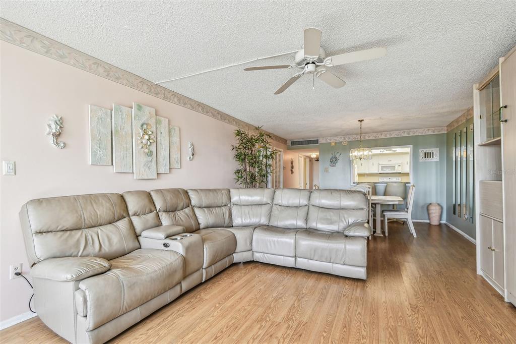 17920 Gulf Boulevard, Unit 208 Redington Shores, FL 33708 - Photo 9 of 98 a living room with furniture and a large window