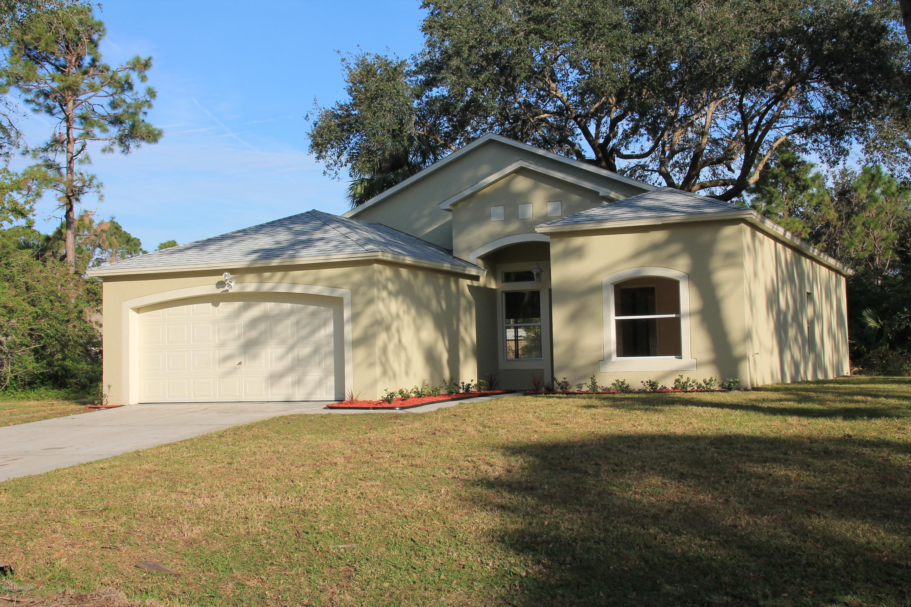 771 Titan Road Southeast Palm Bay, FL 32909 - Photo 1 of 19 Your New Home