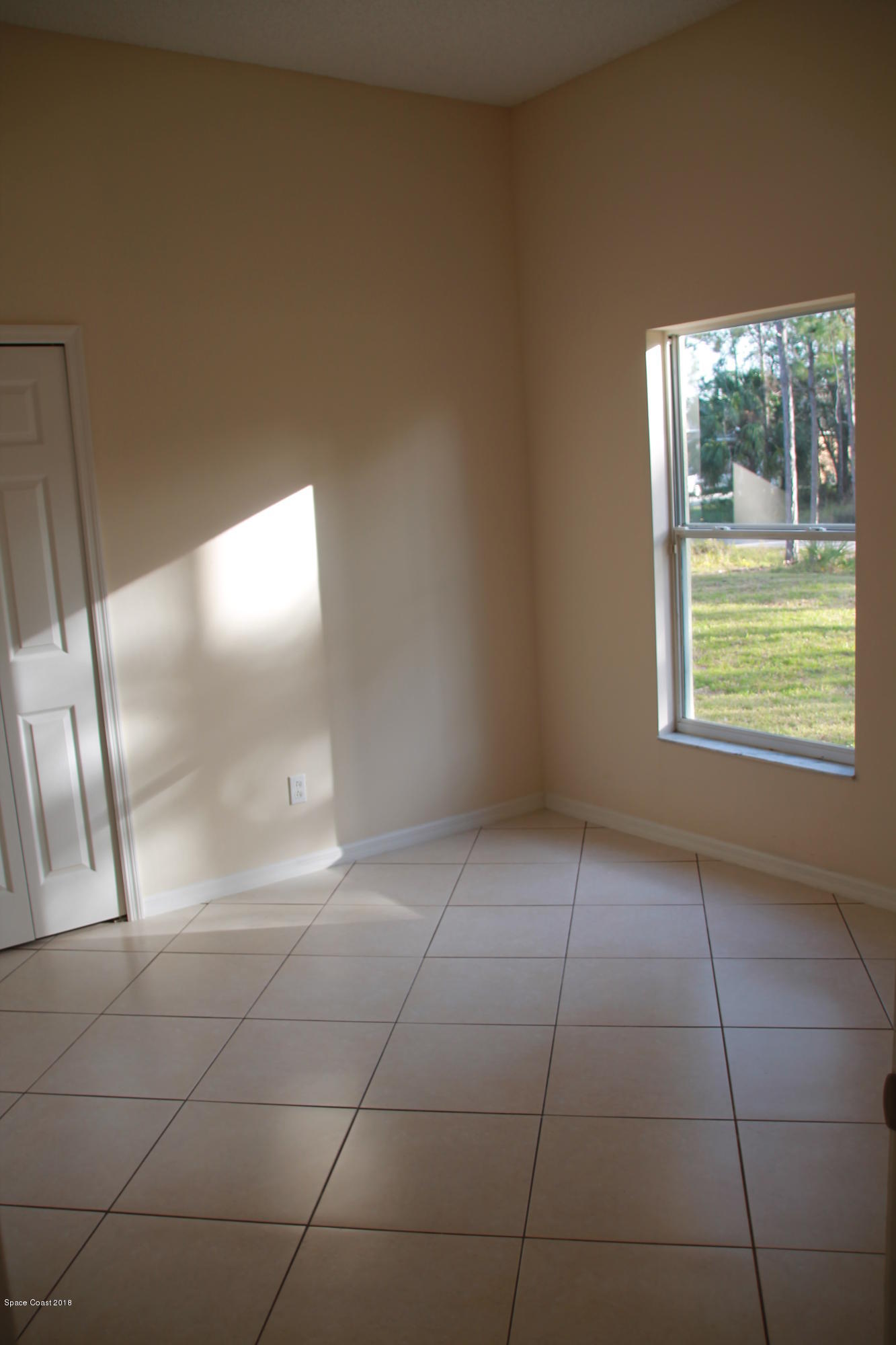 771 Titan Road Southeast Palm Bay, FL 32909 - Photo 14 of 19 Guest Bedroom