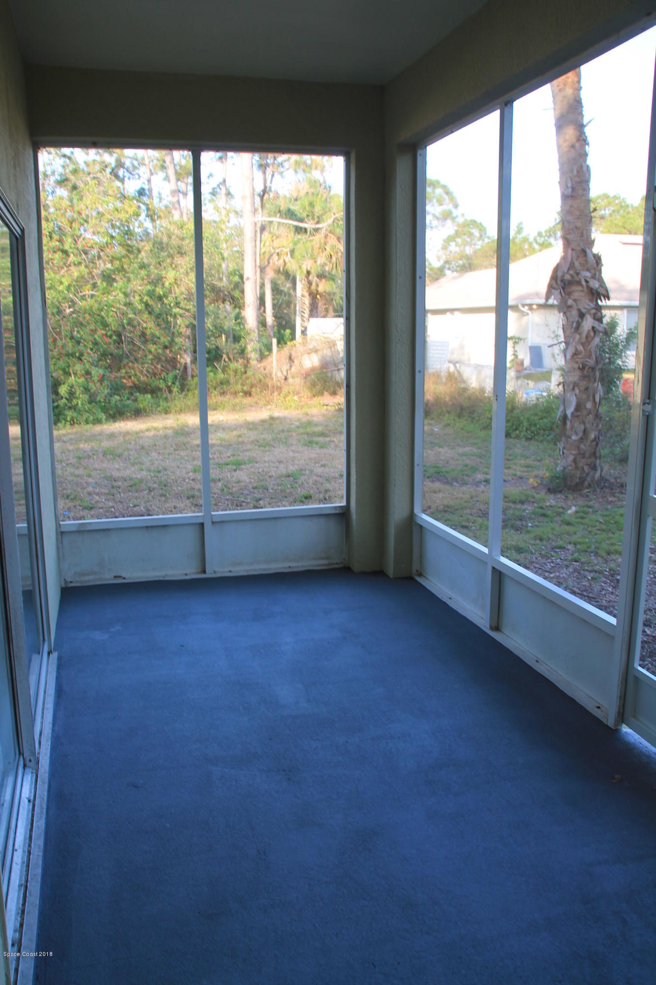 771 Titan Road Southeast Palm Bay, FL 32909 - Photo 17 of 19 Screened Patio