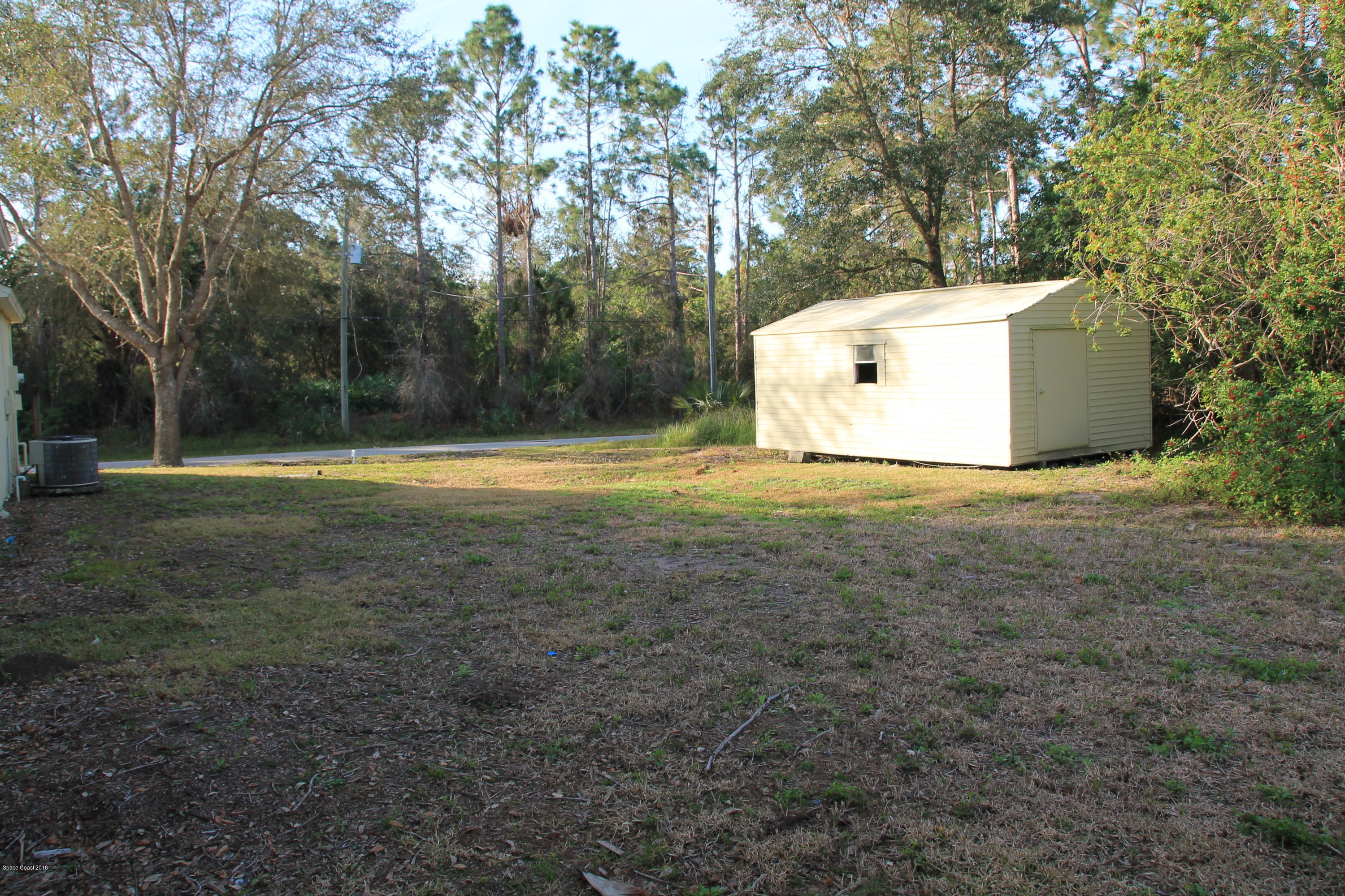771 Titan Road Southeast Palm Bay, FL 32909 - Photo 19 of 19 Side Yard