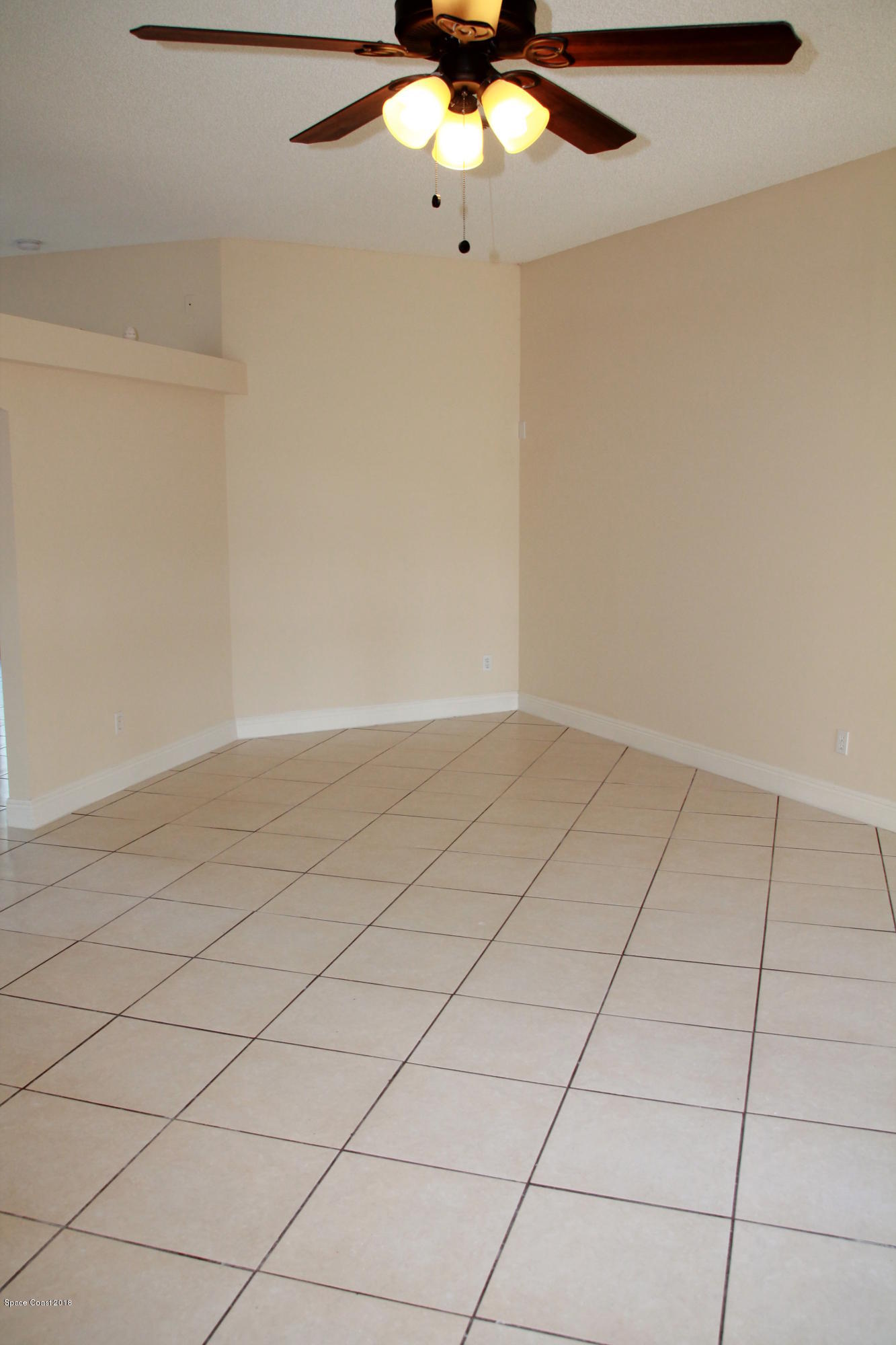 771 Titan Road Southeast Palm Bay, FL 32909 - Photo 4 of 19 Living Room