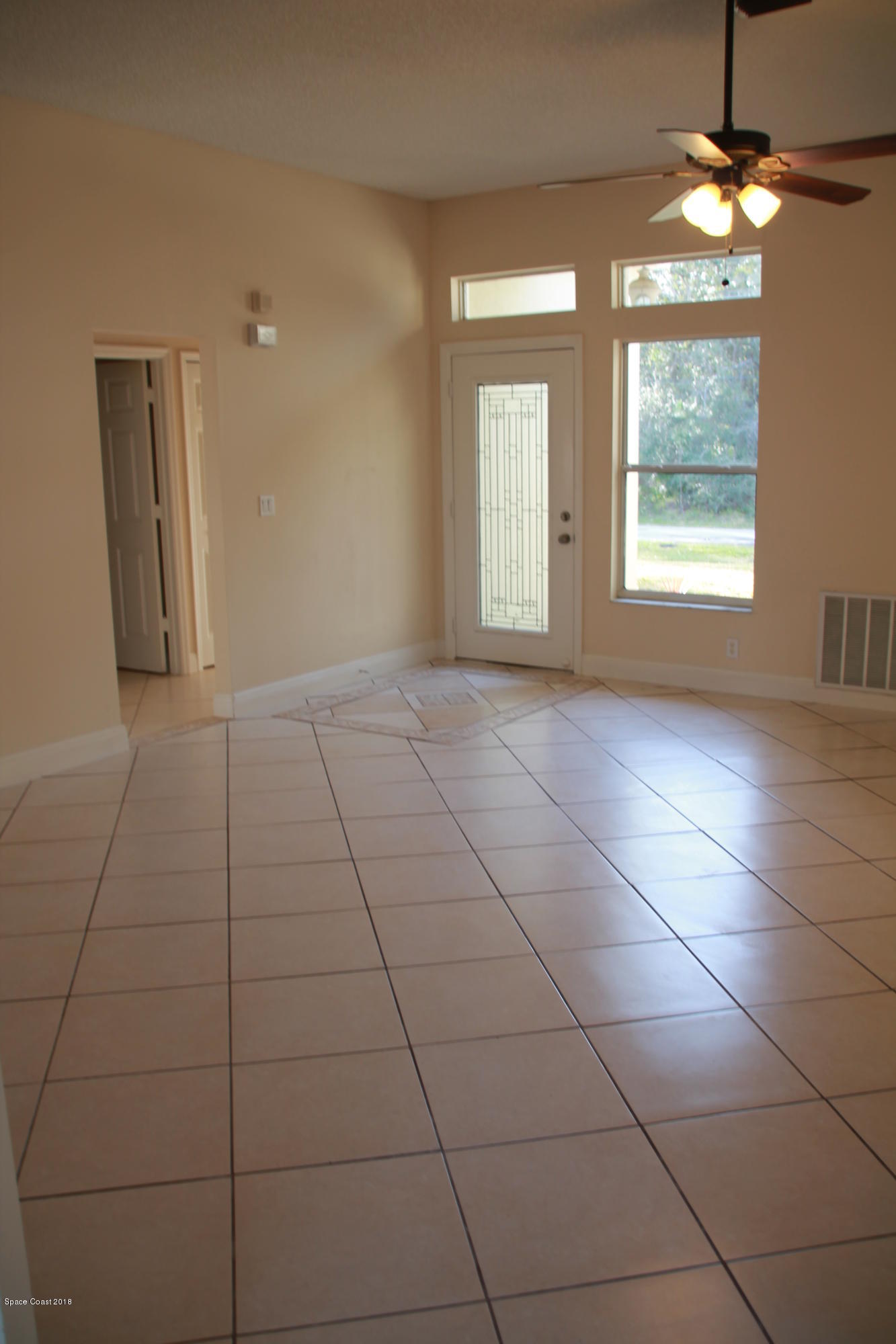 771 Titan Road Southeast Palm Bay, FL 32909 - Photo 6 of 19 Living Room View 3